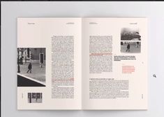 an open book with black and white photos on it's pages, showing people walking down the street