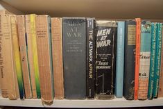 a book shelf filled with lots of books on top of eachother's shelves