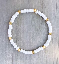 Wooden Mama Bracelet / Wood Mama Bracelet / Wood Beaded Bracelet / Natural Wood Beads / Natural Beaded Bracelet / Earthy Bracelet - Etsy Minimalist White Bracelet With Gold Beads, Gold Bracelets With 8mm Beads For Beach, Everyday White Beaded Rosary Bracelet, White Friendship Bracelets With 8mm Beads, White Spiritual Beaded Bracelets With Gold Beads, White Spiritual Beaded Bracelet With Gold Beads, White Bracelet With Gold Beads, White Rosary Bracelet With Colorful Beads, White Colorful Beaded Rosary Bracelet