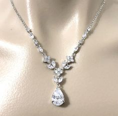 "A classic woodland wedding nature inspired teardrop bridal necklace featuring vines, leaves and flower petal pendant, made of sparkly clear cubic zirconia. This beautiful cz jewelry comes in tarnish-resistant silver rhodium plated chain. Necklace length is adjustable from 17\" (43cm) to 19\" (48cm) . View matching pieces or similar designs at https://etsy.me/2JAovjr View designs related to vines, branches, twigs or leaves at https://etsy.me/1E5j438 View designs with marquise shapes at https://e Leaves Jewelry, Wedding Nature, Vines Leaves, Necklace Leaf, Crystal Wedding Jewelry, Pearl Bridal Jewelry, Swarovski Necklace, Vintage Style Wedding, Leaf Jewelry