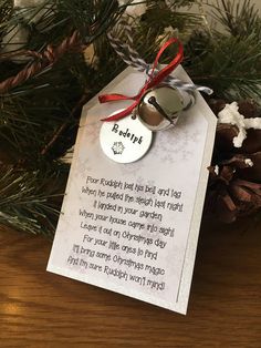 a christmas ornament hanging from a tree with a poem written on the tag