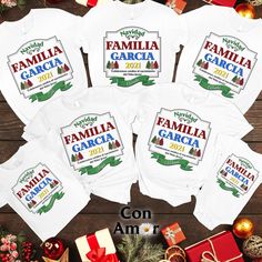 Celebra y disfruta al máximo junto a tu familia esta Navidad 2021. Crea memorias hermosas al tomar fotos usando estas camisetas personalizadas con el apellido de la familia. Haz de esta reunión familiar navideña una única y especial. Unisex T-Shirt Gildan Softstyle Tee          Comfortable and flattering         Durable cotton fabric Pre-shrunk fabric         Double-stitched neckline and sleeves        Regular fit        High Quality DTG Printing!         How to choose the perfect fit:                                                           Please refer to the Size Chart in the product's photos.                                                         Tips for Sizes:                                                         To find your best fit, we recommend that you use the measurements f Family Holiday T-shirt With Letter Print, Family Holiday Letter Print T-shirt, Holiday Letter Print T-shirt, Holiday Family Letter Print Tops, Holiday Letter Print Tops For Family, Letter Print Tops For Family Holiday, Holiday Tops With Letter Print, Family Matching Shirts, Merry Christmas Shirts