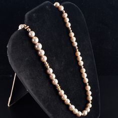 18k Yellow Gold Cultured Round Pearl Diamond Gold Bead Necklace .40ctw 57.9gMetal Information: 18k Yellow GoldTotal Weight: 57.9gNecklace Width: 11.6mmNecklace Length: 22"Stone InformationMain StoneGem Type: PearlShape: Round (11.6mm - 8.1mm)Color: CreamClarity/Quality: AANumber of Stones: 47Accent StoneGem Type: DiamondShape: Single Round (1.0mm)Color: IClarity/Quality: I1Carat Weight: .005ctNumber of Stones: 80Total estimated ctw (carat total weight): .40ctwEstimated Retail Price: $3910.00OUR Luxury Gold Beads Necklace For Formal Occasions, Luxury Gold Beaded Formal Necklaces, Luxury Gold Beaded Necklaces For Formal Occasions, Luxury Formal Gold Beaded Necklaces, Gold Beaded Pearl Necklace For Formal Occasions, Formal Yellow Gold Beaded Necklace, Formal Gold Beaded Necklaces, Formal Necklace With Round Gold Beads, Formal Round Jewelry With Gold Beads