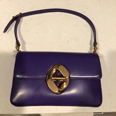 Brand New, Tags Still Attached, Stuffing Is Still In There. Not My Style - Was Given As A Gift. I've Included A Picture From The Website. Purple Purse With Big Gold Clasp To Open It. Elegant Purple Shoulder Bag, Chic Purple Shoulder Bag For Office, Chic Purple Office Shoulder Bag, Elegant Purple Rectangular Shoulder Bag, Luxury Purple Formal Bag, Luxury Purple Formal Bags, Elegant Purple Satchel Shoulder Bag, Classic Purple Evening Bag, Purple Shoulder Bag With Detachable Handle For Evening