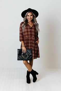 You will surely be in a cherry mood when you wear this charming tunic dress featuring lightweight material patterned with a brown and dark red hued plaid print, a v-cut neckline, loose 3/4-length sleeves, and a relaxed silhouette that falls into a straight mid-thigh length hemline! Measurements S : Bust 44", Hip 50", Length 33", Sleeve Length 15.5", Waist 44". M : Bust 46", Hip 52", Length 33.5", Sleeve Length 16", Waist 46". L : Bust 48", Hip 54", Length 34", Sleeve Length 16", Waist 48". XL : Casual Brown Plaid Dress For Fall, Long Sleeve Brown Plaid Dress For Fall, Fall Plaid V-neck Dress, Casual Burgundy Dress For Fall, Plaid Tunic Dress, Plaid Tunic, Plaid Jacket, Model Fits, V Cut