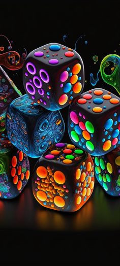 many different colored dices are stacked on top of each other in this artistic photo