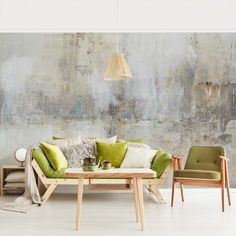 a living room filled with furniture and a painting on the wall behind it's back