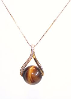 Tiger Eye Pendant 18k Gold filled chain Gold plated Pendant ✤ Shipping ✤ I hand-make each necklace you see in the picture and each piece it's ready to ship.  ✤ Tiger Eye  properties ✤ ✯ All you have to do to know the spiritual value of tigereye is think of its name. Tigereye promotes clear-eyed vision, helping us see ourselves and the world better. Like the great cat it's named for, this gemstone knows the importance of being attentive to the details. Tigereye is said to combine earth energy wit Tigers Eye Crystal Necklace, Planet Jewelry, Cat Eye Necklace, Tiger Eye Necklace, Tiger Necklace, Tiger Eye Jewelry, Tigers Eye Necklace, Jewelry Tattoo, Necklace For Her