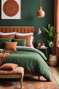 a bedroom with green walls and an orange bed