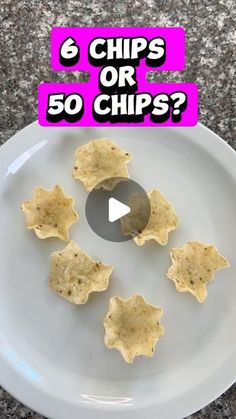 a white plate topped with chips on top of a table