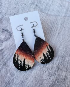 "Single Sided Sublimation Earrings *These Gorgeous sublimated earrings have the design on the front side, with the back being a dark brown. They are light weight and the colors are bright and vibrant! *Stainless steel fish hook hardware * 2\" Teardrop shape length. Total Length 2.5\" *Made from 1/8\" thick MDF hardwood with acrylic front. *Note that colors may appear slightly different on your computer/phone/tablet in comparison to actual design. *Ask about personalization and custom designs bea Sublimated Wood Earrings, Diy Painted Earrings, Wood Earring Designs, Wooden Painted Earrings, Wood Earring Ideas, Diy Wood Earrings, Wood Earrings Diy, Hand Painted Earrings Wood, Sublimated Earrings