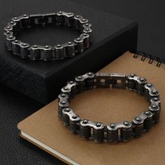 If you are adventurous enough to play with your style in wearing a piece of jewelry, then this edgy Bracelet by Innovato Design is perfect for you. It comes with a loud design that is excellent for those who seek out some fun in provocative creations. Made of 316L stainless steel, this amazing bracelet has an antique color that you will love to see every time you wear it, and you will love to flaunt it to your family and friends. It is in the form of a motorcycle chain link that is thick in desi Black Punk Style Chain Bracelet As Gift, Punk Style Black Chain Bracelet Gift, Black Punk Style Chain Bracelet For Gift, Black Punk Chain Bracelet As A Gift, Stainless Steel Bracelet For Streetwear, Trendy Stainless Steel Box Chain Bracelet, Trendy Stainless Steel Box Chain Bracelets, Adjustable Stainless Steel Punk Bracelets, Trendy Silver Metal Wristband