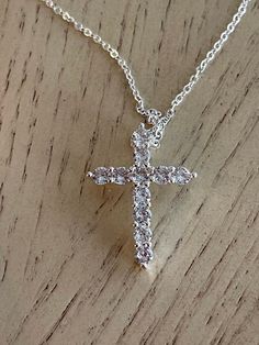 Silver Cross necklaces Choose from peridot, white topaz, citrine, amethyst or pink topaz. Silver 925 chain. 18 inch chain. Pendant is 1 inch long.