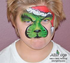 Grinch green Santa hat Christmas winter grumpy Dr Seuss face paint Design seen posted by Susan Bowman Kids Face Paint Ideas, Christmas Face Painting For Kids, Grinch Face Paint, Face Painting For Kids, Grinch Movie, Elf Face, Face P