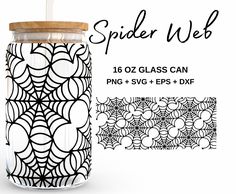 the spider web tumbler glass can has a straw in it