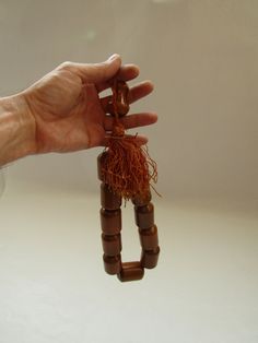 "Vintage folk Greek big handmade wooden decorative worry beads \" koboloi\" Good vintage condition. Full Length with cord 30 cm. All my packages are registered and you will be olso receiving tracking number. Please ask if you have any questions. Visit our shop for more colector's items. https://www.etsy.com/shop/prestigiousantiques?ref=hdr" Traditional Round Wooden Beads, Traditional Large Brown Beads, Traditional Hand-strung Brown Beads, Vintage Red Wooden Beads, Traditional Brown Large Beads, Modernist Ring, Retro Ring, Decorative Beads, Modernist Jewelry