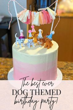 the best ever dog themed birthday party is on cake with pink and white frosting