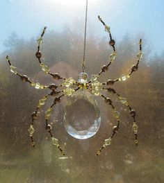 a spider made out of glass and beads