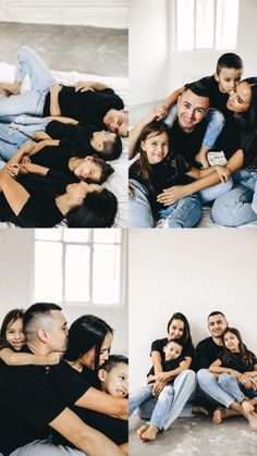 a group of people sitting on top of each other in front of a white wall