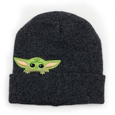 Grogu Beanie Quick Shipping. US Seller. Guaranteed Authentic Officially Licensed Merchandise. Shipped from our Smoke Free/Pet Free Boutique. Brand New with tags in sealed catalog bag. This is the way! Grab this awesome beanie, featuring the Child from your favorite TV show—the Mandalorian! Grogu is peeking over the brim of the beanie! With colorful embroidery and a classic style, this Baby Yoda hat is sure to be the perfect gift for any Mandalorian fan! Product Details Officially Licensed Star W Baby Yoda Hat, The Mandalorian Grogu, Mandalorian Grogu, Mickey Mouse Hat, Kids Winter Hats, Catalog Bag, Disney World Magic Kingdom, Star Wars Men, Colorful Embroidery