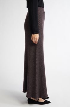 Ribbed cashmere flows easily into the A-line silhouette of sumptuous sweater-skirt that showcases the label's emphasis on thoughtful craftsmanship. Elastic waist 100% cashmere Hand wash, dry flat Made in the UK Designer Clothing Elegant A-line Bottoms For Winter, Chic Long Wool Skirt, Elegant Brown Full-length Maxi Skirt, Elegant Brown Full Length Maxi Skirt, Chic Wool A-line Bottoms, Fitted Wool Maxi Skirt For Fall, Elegant Wide Leg Maxi Skirt For Fall, Fitted Cashmere Bottoms For Winter, Spring Long Wool Skirt