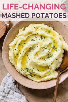 mashed potatoes in a bowl with a spoon on the side and text overlay that reads, life - changing mashed potatoes