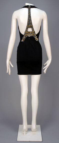 Dress by Emanuel Ungaro with Eiffel halter back. Whitaker Auctions Paris Pictures, Skating Dress, Emanuel Ungaro, Paris Print, Black Halter Dress, Paris Eiffel Tower, Skating Dresses, Dress Ideas, Black Stretch