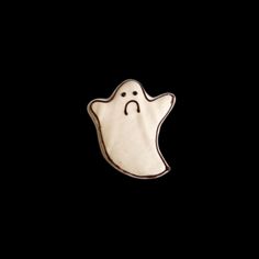 a white ghost on a black background