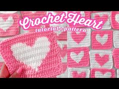 the crochet heart pattern is shown with pink and white hearts on it,