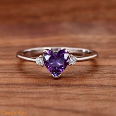 Heart Purple Cubic Zirconia Sterling Silver Ring, Simulated February Birthstone Amethyst Color CZ Sterling Silver Girls Teens Womens Ring ▷Gift Box Included ▷7mm Height ▷Size 3 - 12 Available ▷925 Sterling Silver (not plated or filled) ▷925 Stamp Authenticity ▷High-Quality Cubic Zirconia Used https://www.etsy.com/shop/TrendyRing