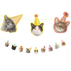 a party banner with cats and hats on it