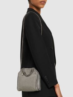 Height: 19cm Width: 18cm Depth: 6cm. Metal chain shoulder strap. Double metal chain top handles. Internal magnetic button closure. One internal pocket. Nylon jacquard logo lining Falabella Bag, Stella Mccartney Falabella, Chain Top, Faux Leather Bag, Logo Line, Bag Light, Grey Women, Metal Chain, Stella Mccartney