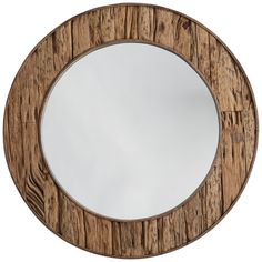 a round mirror made out of wooden planks