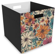 a colorful flower pattern storage bin with handles