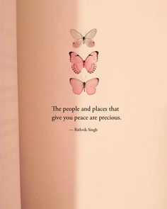 a pink wall with two butterflies on it and a quote about the people and places that give you peace are precious