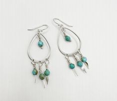 OH. EM. GEE!!! Girl, These are amazing!!! Get them quick! Beautiful sterling silver chandelier earrings with 4 dangling wire wrapped light blue-green faceted turquoise beads per earring!!!- PCJ designed and handmade - Genuine turquoise - Genuine sterling silver - Measures 2 1/4" x 3/4" Texas Cowboy Boots, Turquoise Heart Ring, Turquoise Silver Bracelet, Wrapped Lights, Silver Chandelier Earrings, Dream Catcher Earrings, Silver Chandelier, Turquoise Heart, Light Blue Green