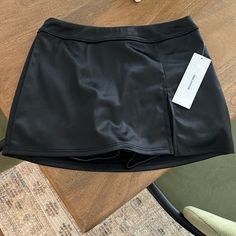 Nwt Urban Outfitters Black Skort, Size Xs. Wear To Workout Or Run Errand, Material Has A Sheen To It. Solid Short Skort For Night Out, Urban Outfitters High Waist Fitted Shorts, Urban Outfitters High Waist Shorts, Urban Outfitters High-waisted Fitted Shorts, Urban Outfitters Black Bottoms For Night Out, Fitted Shorts From Urban Outfitters, Urban Outfitters Black Shorts, Urban Outfitters Black Short Length Bottoms, Chic Urban Outfitters Short Bottoms