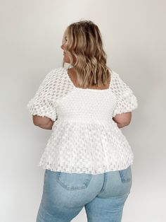 The American Sweetheart Top, crafted from ultra soft fabric, is an ethereal piece of art. Featuring a stretchy smocked back panel, sweetheart neckline, and charming checkered pattern, it flaunts soft frayed details for a hint of playfulness. Its babydoll fit, puff sleeves, and light, airy feel bring an angelic quality sure to turn heads. An ideal choice for warm spring and summer days, its girly look is sure to lend charm to any occasion. 100% Polyester Hand wash cold separately. White Smocked Square Neck Top With Ruched Detail, White Smocked Ruched Top With Square Neck, White Smocked Top With Ruched Square Neck, White Chic Smocked Top, Chic White Smocked Top, White Smocked Top For Brunch, White Fitted Smocked Top For Brunch, Chic White Smocked Top With Square Neck, White Feminine Smocked Top With Smocked Bodice