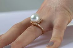 For Sale on 1stDibs - A showstopping cocktail ring by Yoko London that is sure to make a big impression. Featuring a lustrous 13.2mm South Sea Pearl at its centre and adorned Yoko London, South Seas, Cocktail Ring