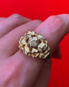 A unique gold statement ring with a slight split shank featuring a large cluster of nuggets with a florentine finish. Crafted in solid 9ct gold. Hallmarked. In pristine condition, professionally cleaned & polished. Refer to images for more information. Size: UK size T, US size 9 5/8. Weight: 6.5 grams. Gold Collectible Cluster Ring, Gold Nugget Cluster Ring In 14k, Luxury Yellow Gold Cluster Ring, Antique Gold Cluster Ring With Diamond Cut, Victorian Gold Cluster Ring With Diamond Cut, Yellow Gold Nugget Cluster Ring For Anniversary, Vintage Gold Cluster Ring As Gift, Vintage Gold Cluster Ring Gift, Unique Gold Cluster Ring