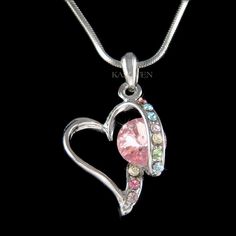 "Want a personalized gift? -Add a Swarovski Crystal Birthstone charm here: https://www.etsy.com/listing/577441131 PERFECT CHRISTMAS GIFT FOR Lady!! You are getting an Elegant HEART Pendant with Swarovski crystals. It comes with a FREE 18\" Original Rhodium Plated Snake Chain necklace with lobster clasp. The chain is removable, so you can put any chain, ribbon or rubber cord through the pendant. Pendant size is 9/16\" wide X 1 1/16\" high (17mm X 28mm). Crystal Color: Light Rose, Light Sapphire, Thushi Necklace, Roses Valentine, Gold Link Necklace, Crystal Rainbow, 30th Birthday Gift, Choker Gold, Gold Link, Pink Valentines, 30th Birthday Gifts