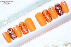 Shape Shown: Sculpted Medium Square Size Shown: Custom This fun set is just what you need for Fall! A mixture of orange, red and gold to mimic the beautiful colours of the changing leaves. Wearing this set will for sure get you noticed! Swarovski Crystals are used on the pinky and middle fingers. This is a single set which means that you will be getting 10 nails in total. Kit includes: Buffer Cuticle Pusher Glue Nail File Nail Tabs Please re-pin 😍💞swarovski jewelry, swarovski tennis bracelet, Nail Place, Middle Fingers, Long Stiletto, Changing Leaves, Cuticle Pusher, Nails At Home, Swarovski Jewelry, Nail Decals