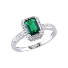 This luxurious 1.0 carat (ctw) ring shines brightly with a beautiful green emerald. The gorgeous gem features the square emerald cut and is set in sterling silver with diamonds for an ultra-lavish look. 1.0- Carat (ctw) Lab-Created Emerald Ring with Diamonds in Sterling Silver Size: 6.  Gender: female.  Age Group: adult. Emerald Ring With Diamonds, Vintage Halo Ring, Sterling Silver Promise Rings, Simulated Diamond Rings, Emerald Diamond Ring, Lab Created Emerald, Gold Halo, Fashion Ring, Emerald Gemstone