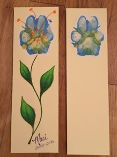 two cards with watercolor flowers on them