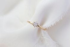 *This listing is for one Delores ring, in solid 14K yellow gold + your 0.50 carat choice of either a natural or labgrown white diamond. Introducing Delores, our most classic setting til date - Delores delicately cradles a 0.50 carat natural or labgrown white diamond in an elevated basket setting on our signature fine band. Made in solid 14K gold and diamond of your choice. We are offering Delores in both natural white diamond and lab-grown white diamond options, please select from dropbox. Also available in 0.25ct, 0.75ct and 1.0ct options and are priced upon request.  Please send us a DM for other carat and customisation options, such as a smaller or bigger diamond carat weight or other gemstone configurations. Specifications: - Solid 14K Yellow Gold - Natural 0.50 carat white diamond (G- Delicate Vs Clarity Diamond Ring For Anniversary, Delicate Anniversary Diamond Ring With Vs Clarity, Simple Round Cut Diamond Ring, Delicate 14k Gold Diamond Ring With Vvs Clarity, Simple Wedding Diamond Ring In 14k Gold, Simple 14k Gold Wedding Diamond Ring, Simple 14k Gold Diamond Wedding Ring, Simple 14k Gold Solitaire Diamond Ring, Simple Yellow Gold Diamond Ring