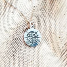 "Looking for a stylish accessory that you can wear every day ? Look no further than this gorgeous and dainty COMPASS necklace! Made of 925 sterling silver, this necklace features a sun compass pendant that's both elegant and practical. Engraved clearly and perfect to combine with other minimalist necklaces, this trendy pendant is also a great gift for any travel lover or globetrotter. Plus, it's also available as a bracelet, making it a versatile addition to your jewelry collection. ♡ DETAILS  P Silver Medallion Charm Necklace For Personalized Gift, Adjustable Stamped Sterling Silver Charm Necklaces, Adjustable Sterling Silver Stamped Charm Necklace, Adjustable Sterling Silver Meaningful Charm Necklaces, Meaningful Adjustable Sterling Silver Charm Necklaces, Adjustable Sterling Silver Meaningful Charm Necklace, Personalized Silver Medallion Charm Necklace, Dainty Silver Engraved Charm Necklaces, Dainty Charm Necklace Gift