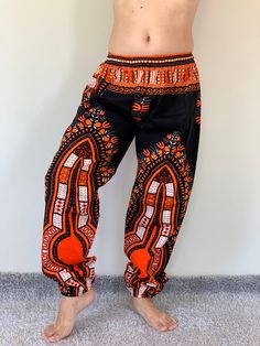 "African dashiki pants cotton Aladdin yoga harem pants, unisex pants elastic waist and ankle cuffs with pockets. Both men and women love these dashiki's for their uniqueness, comfort and easy wash and wear care. Good for any African heritage party, festival or black history month but you can wear from church party & wedding to any party, from lounging around to shopping around be comfortable yet stylish Measurements: Waist: 30-36\" Hips: 50\" Length: 41\" Inseam: 30\" ❤️ PAYMENT We accept pa Yoga Harem Pants, Samurai Pants, Thai Fisherman Pants, Handmade Pants, Fisherman Pants, African Dashiki, Unisex Pants, African Heritage, Wrap Pants