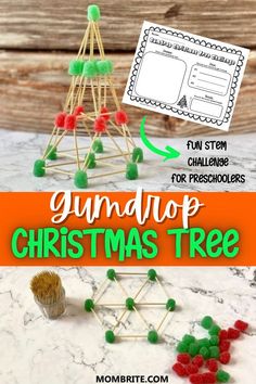 the gumdrop christmas tree is made out of popsicles, and sits on a table