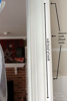 an image of a room with measurements for the door frame and trimming tape on it