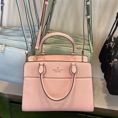 Kate Spade Madison Saffiano Leather Medium Satchel Color: Conch Pink Nwt New With The Tag Authentic Product Details Measurements 9" H X 5.6" D 11.8"W (Bottom) Strap Drop: 4.5" Handle Drop: 4.75" Features Strap Drop: 22" Metal Pinmount Logo Closure Type: Drop In Top Zip Closure Dust Bag Included: No Interior: Back And Front Zip Pocket Exterior: Front Slip Pocket Materials Saffiano Leather Lining: Two Way Script Logo Lining Imported Style Number Kc436 Ksny Editor's Notes We Love How Classic And Fe Cute Kate Spade Bags, Pink Kate Spade Bag, Kate Spade Bag Pink, Kate Spade Purse Pink, High End Handbags, Pink Kate Spade, Kate Spade Crossbody Purse, Girly Bags, Fancy Bags